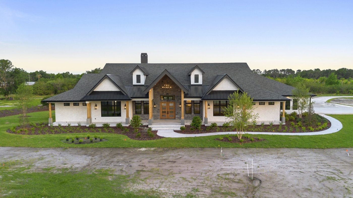 Farmhouse beside a pond